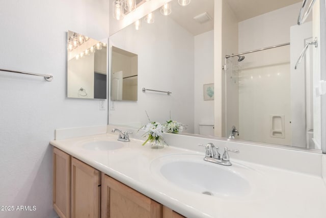 9142 W Pontiac Dr, Peoria, AZ 85382 - bathroom featuring double vanity and a shower