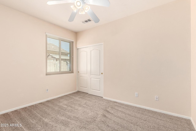 9142 W Pontiac Dr, Peoria, AZ 85382 - spare room featuring a ceiling fan and light colored carpet