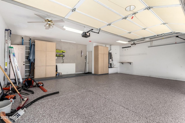9142 W Pontiac Dr, Peoria, AZ 85382 - garage featuring a garage door opener, water heater, and a ceiling fan