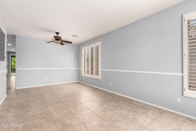 9142 W Pontiac Dr, Peoria, AZ 85382 - unfurnished room with a ceiling fan and light tile patterned flooring