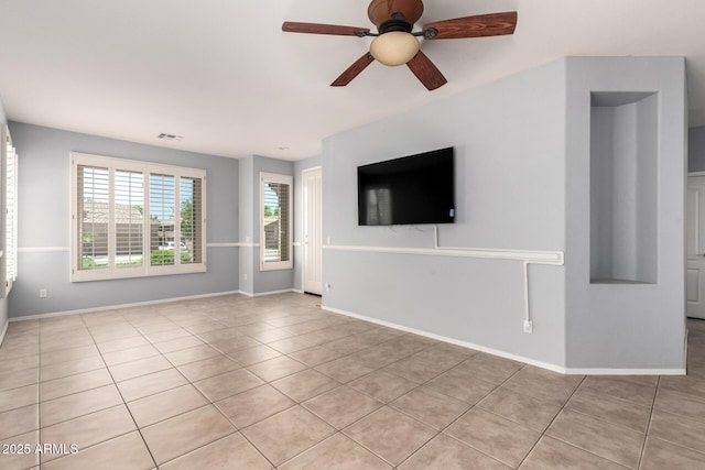9142 W Pontiac Dr, Peoria, AZ 85382 - unfurnished living room with light tile patterned floors and ceiling fan
