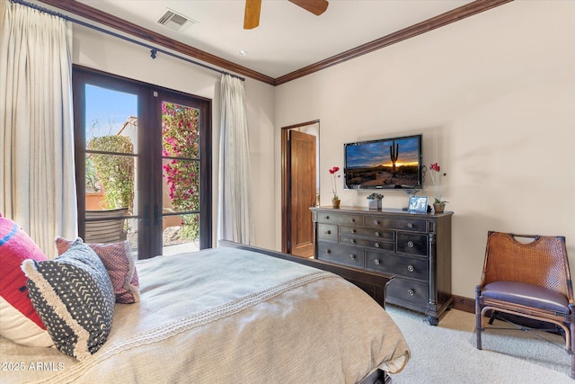 bedroom featuring carpet floors, crown molding, visible vents, ceiling fan, and baseboards