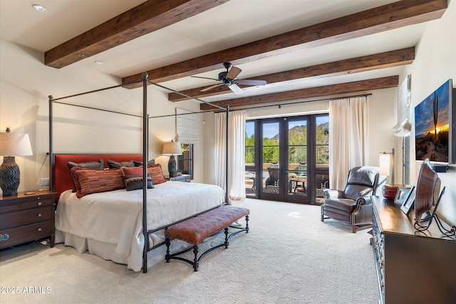 carpeted bedroom with access to exterior, beamed ceiling, and french doors