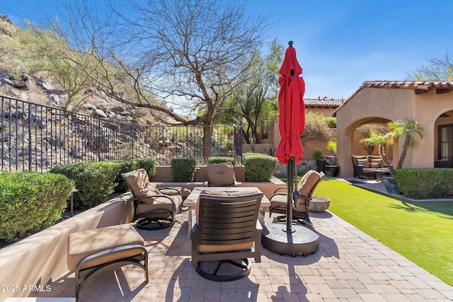 view of patio / terrace with fence