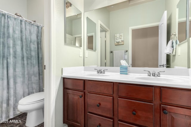 full bathroom featuring tile patterned floors, vanity, shower / bath combination with curtain, and toilet