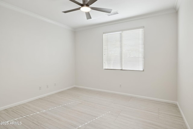 empty room with ceiling fan, ornamental molding, and a healthy amount of sunlight