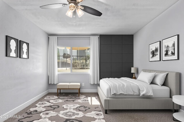 3416 N 44th St Unit 70, Phoenix, AZ 85018 - carpeted bedroom with baseboards and a ceiling fan