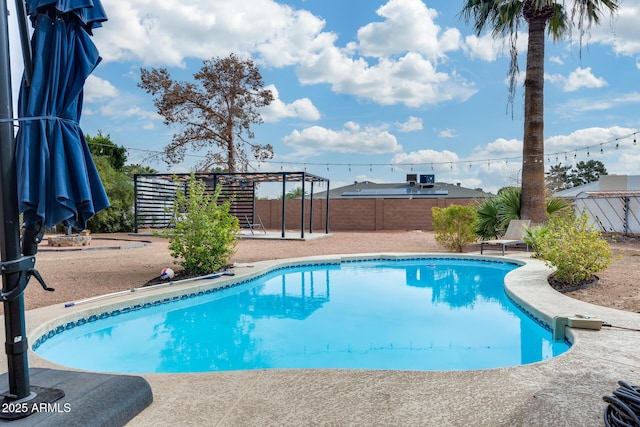 view of pool with a fenced in pool, a patio area, and a fenced backyard