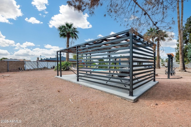 view of property's community featuring fence