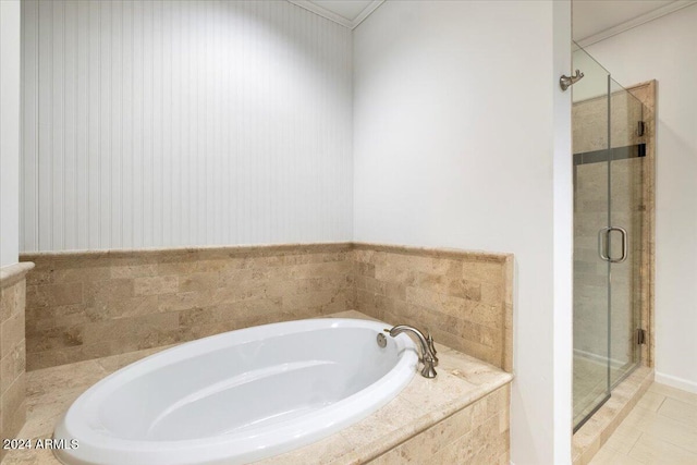 bathroom with tile patterned floors, crown molding, and independent shower and bath