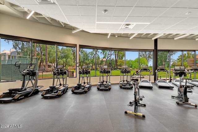 gym featuring a paneled ceiling