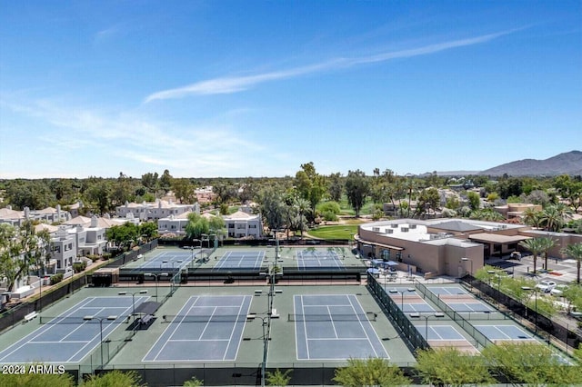 birds eye view of property featuring a mountain view