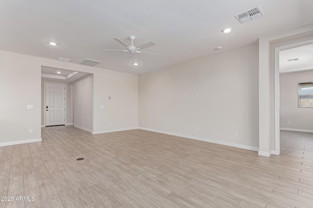 8553 N 175th Ln, Waddell, AZ 85355 - spare room with a ceiling fan, light wood-style flooring, baseboards, and recessed lighting