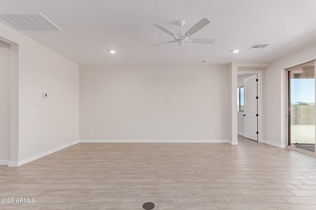 8553 N 175th Ln, Waddell, AZ 85355 - unfurnished room with recessed lighting, a ceiling fan, light wood-style floors, and baseboards
