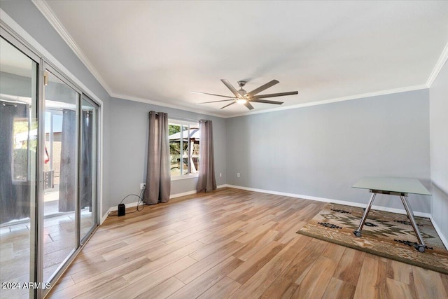 spare room with ceiling fan, ornamental molding, and light hardwood / wood-style flooring