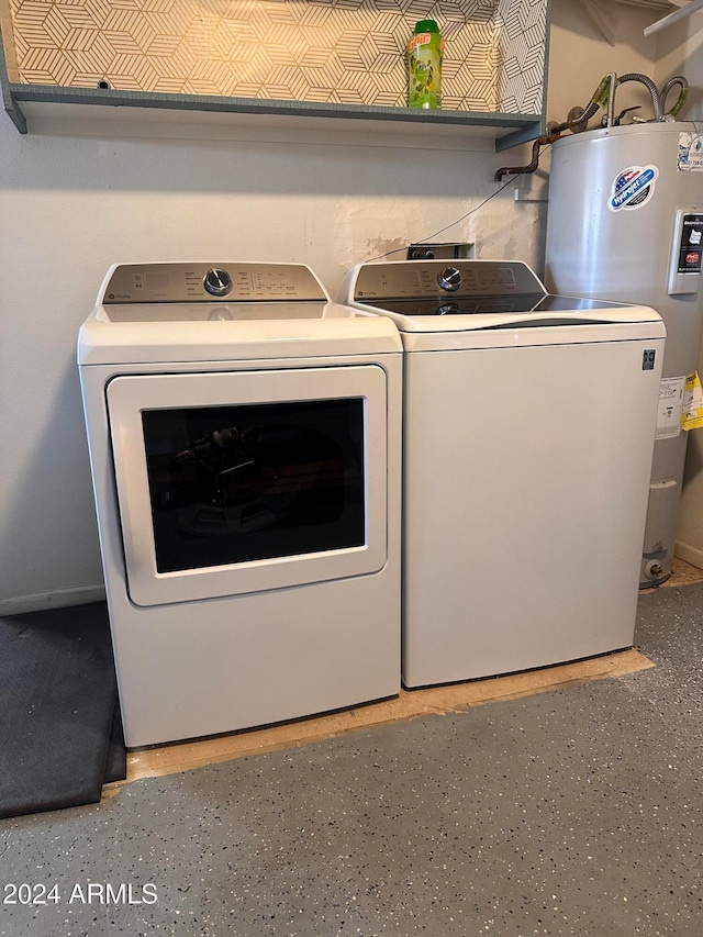 laundry area featuring independent washer and dryer and water heater