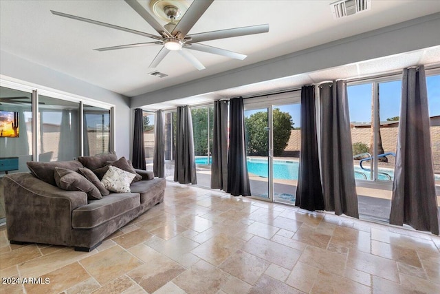 living room featuring ceiling fan