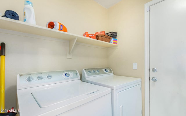 laundry area featuring washing machine and dryer