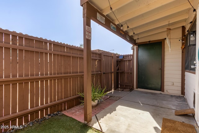 view of patio featuring a fenced backyard