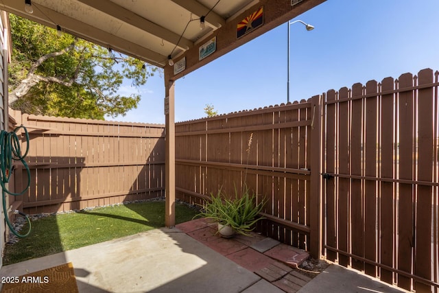 view of patio featuring a fenced backyard