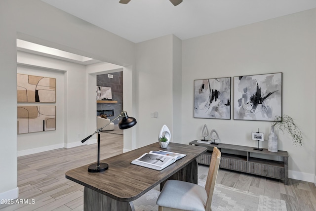 11717 W Red Hawk Dr, Peoria, AZ 85383 - home office featuring light wood-type flooring and ceiling fan