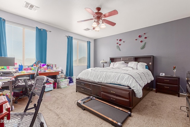 carpeted bedroom featuring ceiling fan