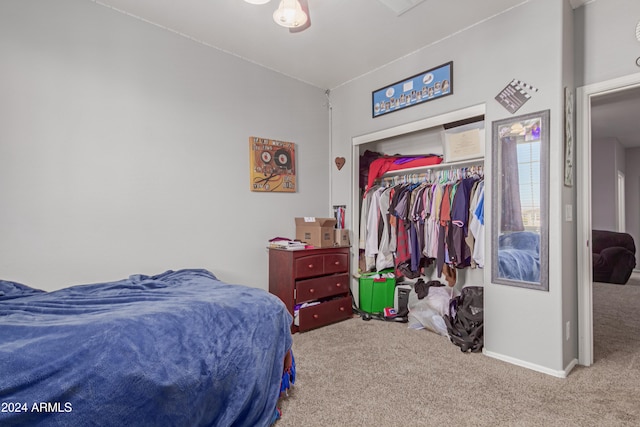 carpeted bedroom with a closet