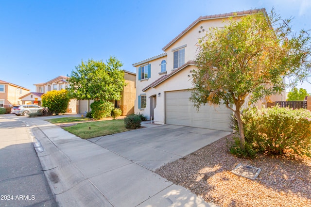 view of front of property featuring a garage