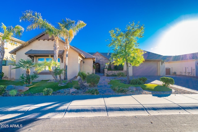 view of front of home with a garage