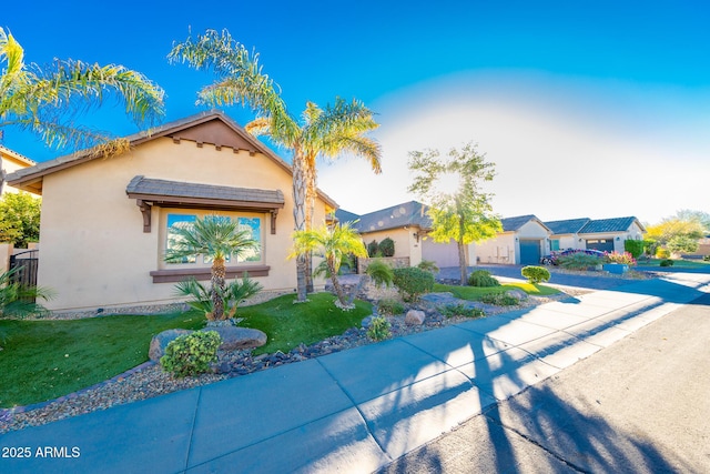 view of front of home featuring a front lawn