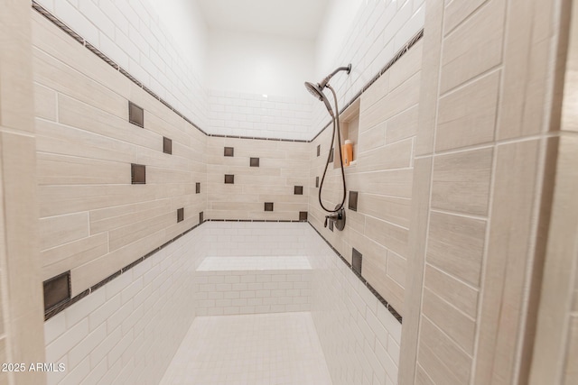 bathroom featuring tiled shower