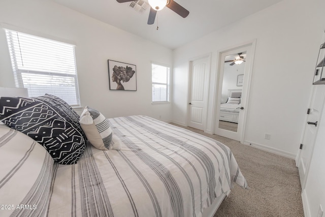 carpeted bedroom featuring ceiling fan