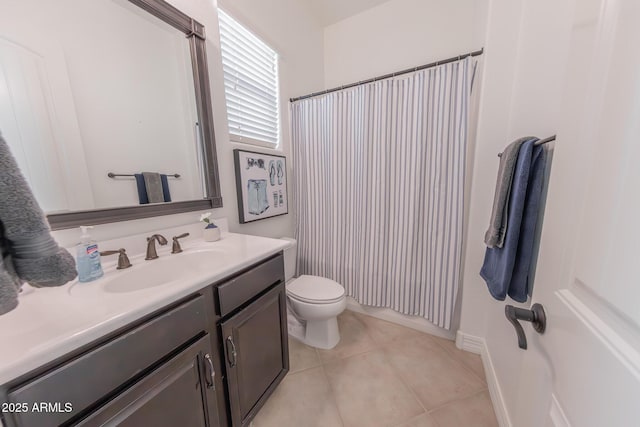 bathroom with toilet, tile patterned floors, a shower with shower curtain, and vanity