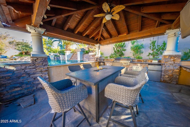 view of patio / terrace featuring a gazebo, grilling area, ceiling fan, and area for grilling