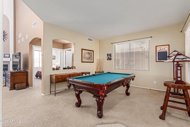 recreation room with pool table, a healthy amount of sunlight, and light colored carpet