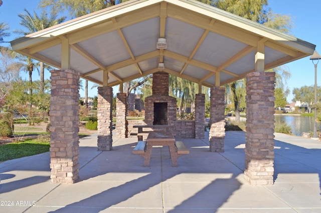 view of property's community featuring a gazebo and a water view