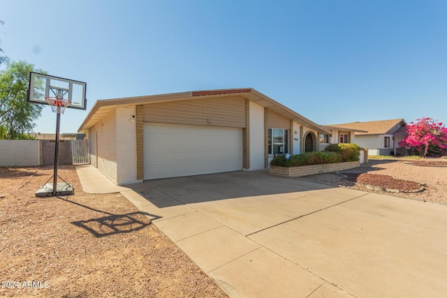 4419 W Vogel Ave, Glendale, AZ 85302 - view of front facade featuring a garage and driveway