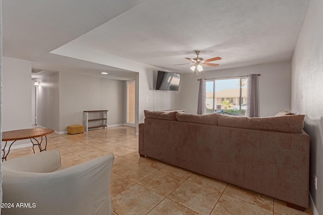 4419 W Vogel Ave, Glendale, AZ 85302 - living room featuring ceiling fan and light tile patterned floors