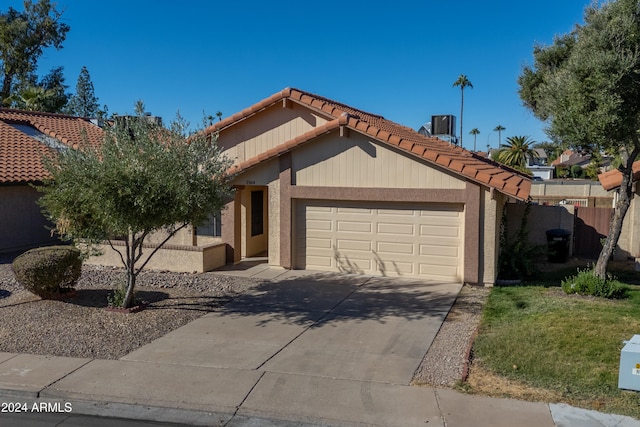 view of front of property with a garage