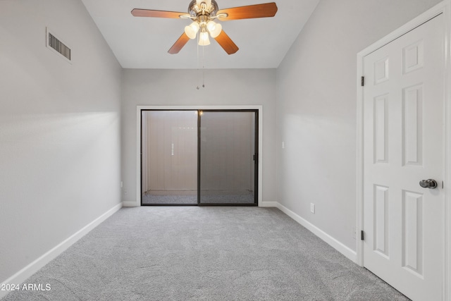 unfurnished bedroom with a closet, ceiling fan, and light carpet