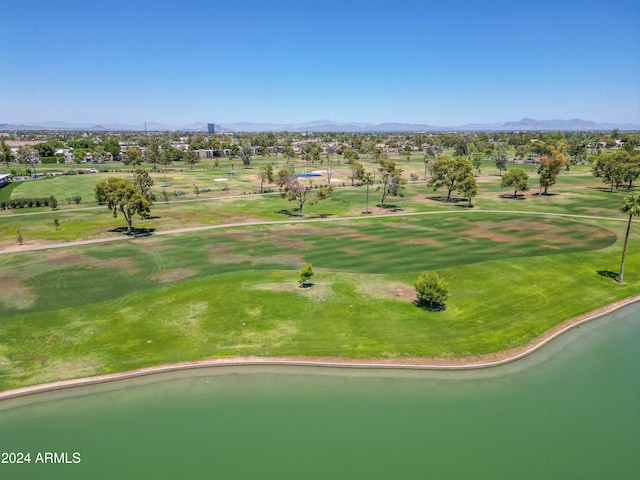 aerial view featuring a water and mountain view