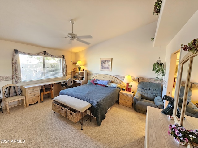 carpeted bedroom featuring ceiling fan and vaulted ceiling