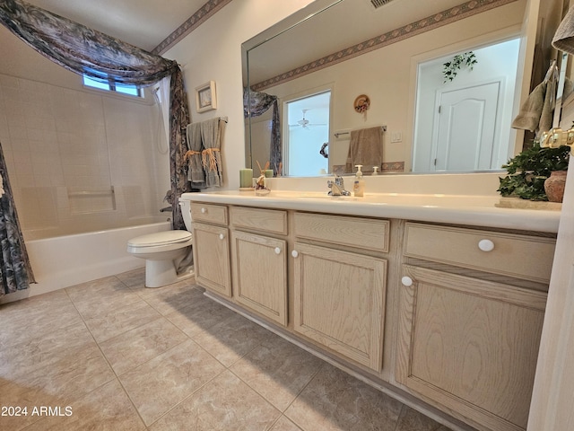 full bathroom featuring tile patterned flooring, vanity, shower / bath combo, and toilet