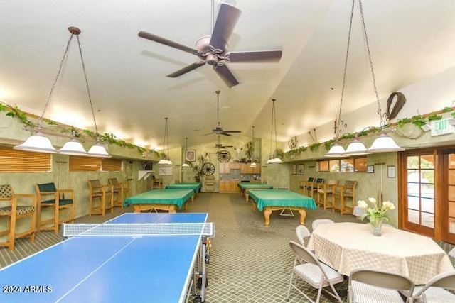 game room with ceiling fan, vaulted ceiling, and billiards