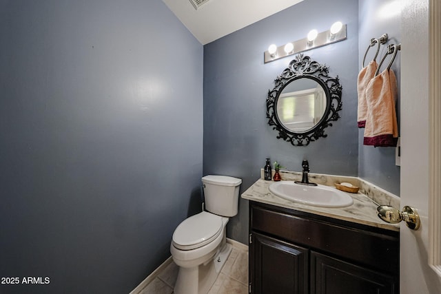 4306 E Raven Rd, Phoenix, AZ 85044 - bathroom with toilet, vanity, lofted ceiling, and baseboards