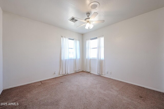 4306 E Raven Rd, Phoenix, AZ 85044 - unfurnished room with carpet floors, a ceiling fan, and baseboards