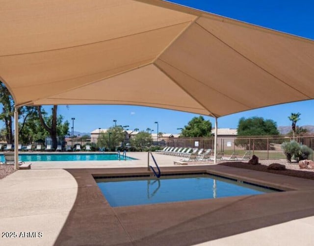 4306 E Raven Rd, Phoenix, AZ 85044 - community pool featuring fence and a patio area