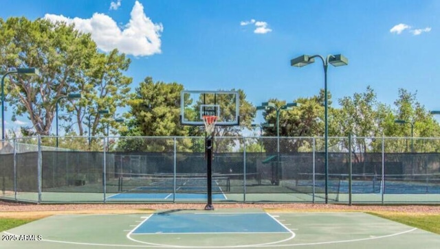 4306 E Raven Rd, Phoenix, AZ 85044 - view of basketball court with a tennis court, community basketball court, and fence