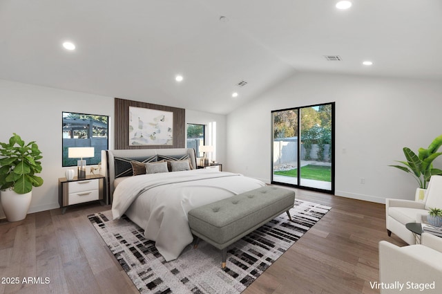 bedroom with access to outside, multiple windows, visible vents, and dark wood finished floors