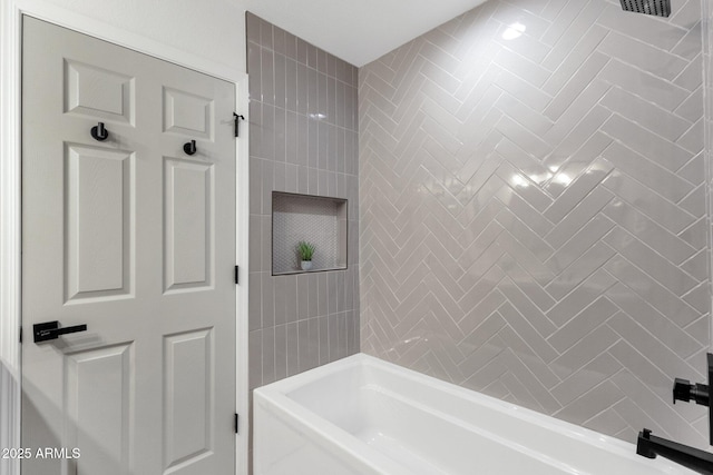 bathroom with visible vents and shower / bathing tub combination